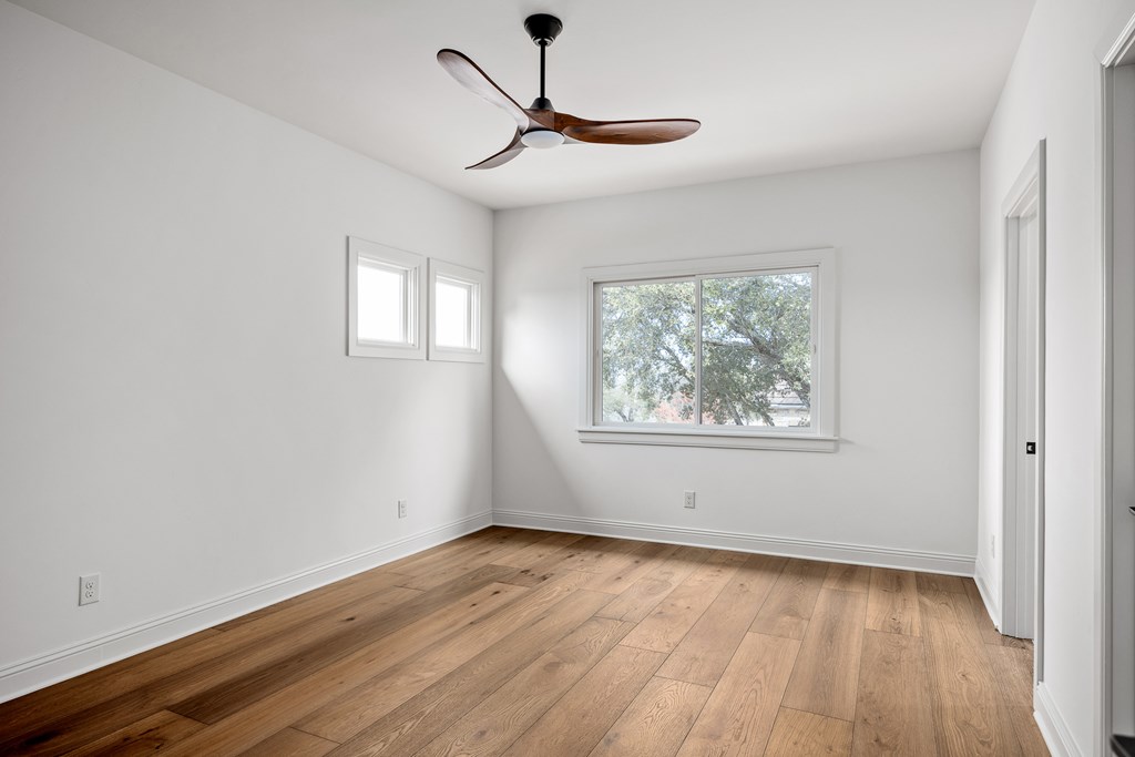 3613 Ranch View Court Kerrville, TX 78028 - Photo 27 of 41 a view of empty room with wooden floor and fan