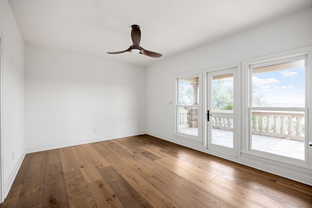 3613 Ranch View Court Kerrville, TX 78028 - Photo 31 of 41 a view of an empty room with wooden floor and a window