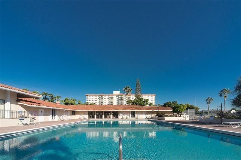 4158 Inverrary Drive, Unit 404 Lauderhill, FL 33319 - Photo 13 of 15 a view of swimming pool and lake view