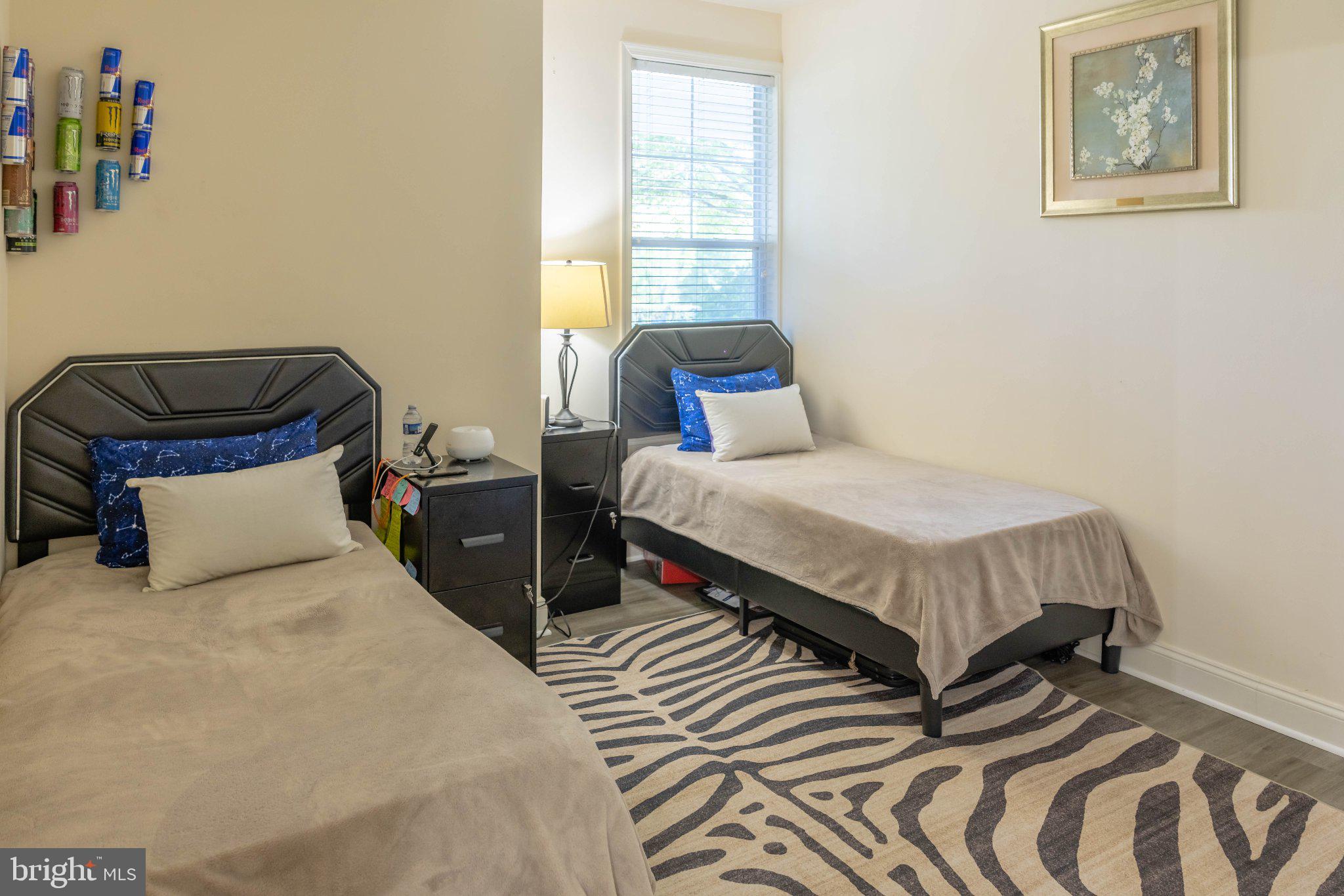 12824 Clarksburg Square Road, Unit 105 Clarksburg, MD 20871 - Photo 62 of 96 Cozy twin bedroom with natural light.