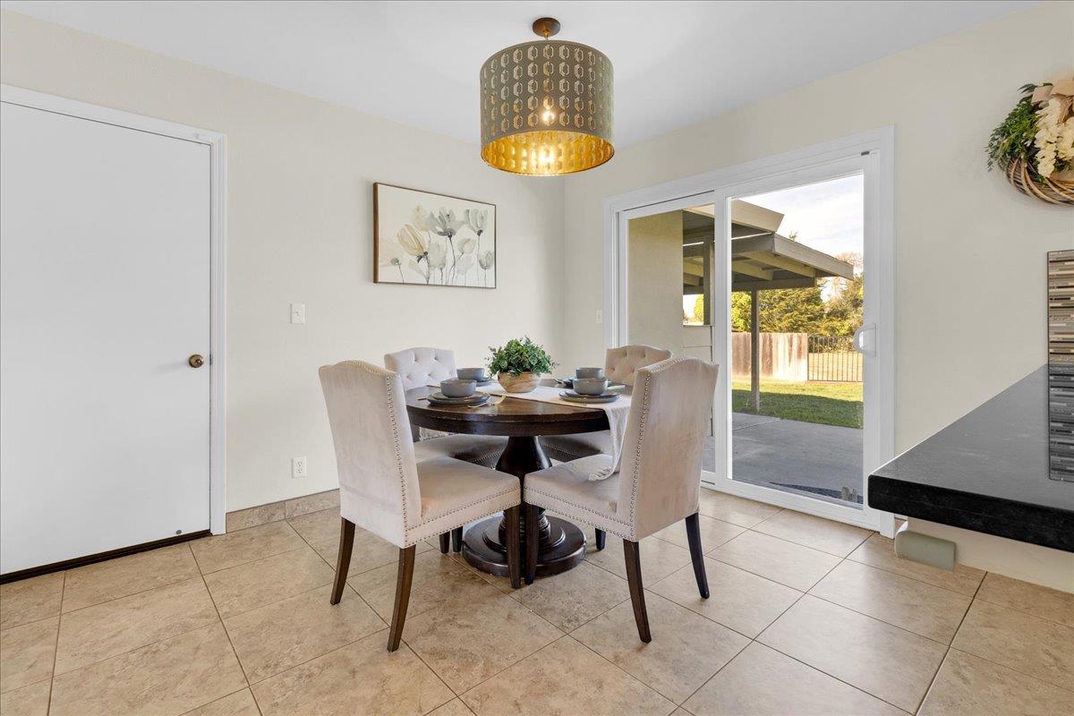18595 Ranchito Del Rio Drive Salinas, CA 93908 - Photo 11 of 40 a dining room with furniture and window