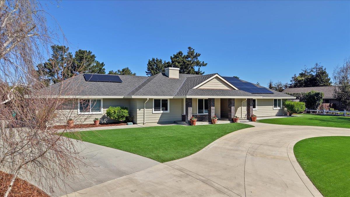 18595 Ranchito Del Rio Drive Salinas, CA 93908 - Photo 2 of 40 a front view of a house with a yard