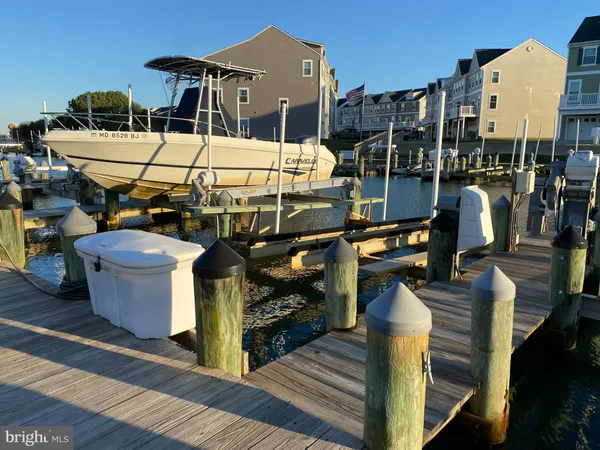 a view of swimming pool with outdoor seating