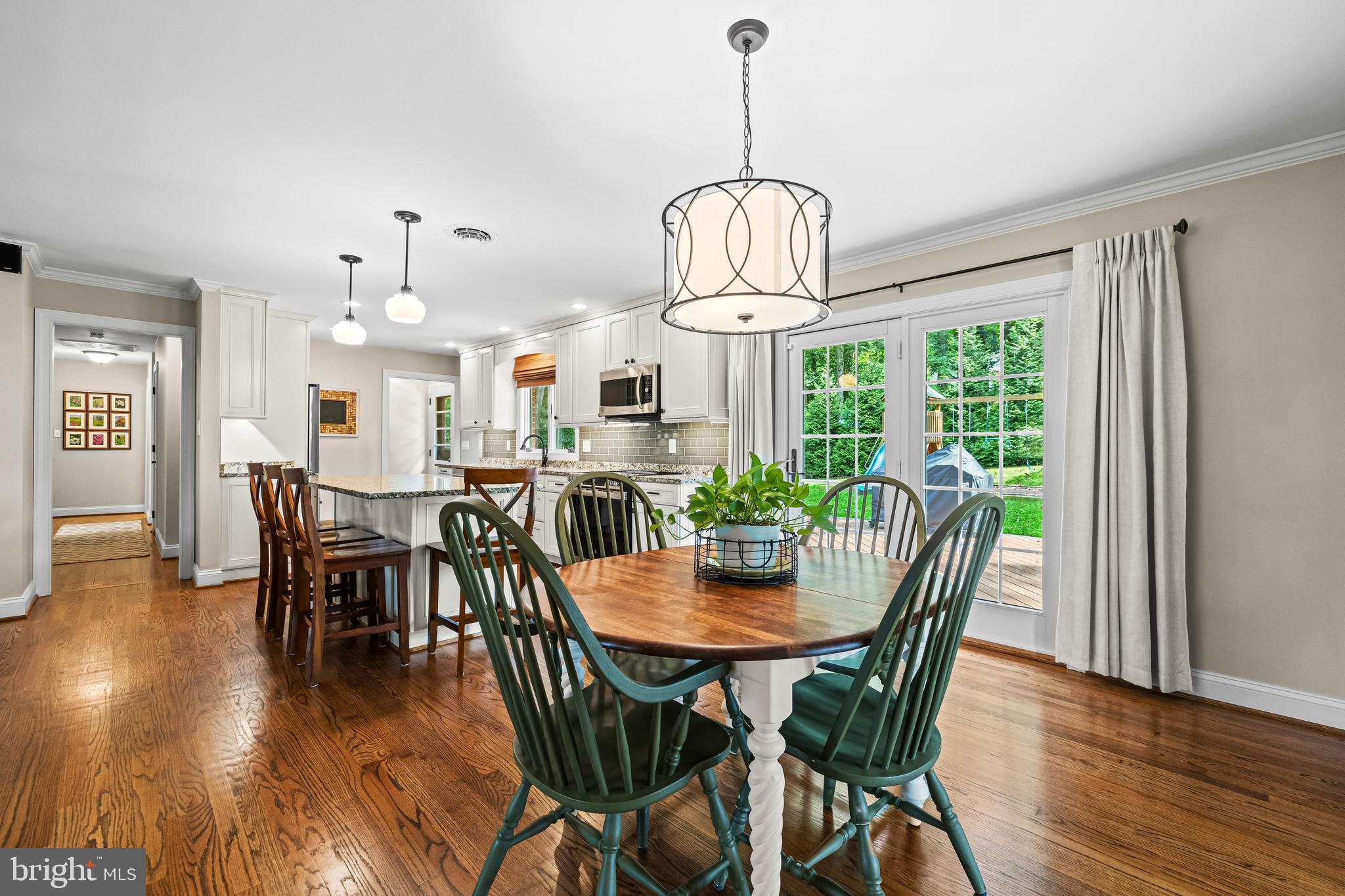 5507 Williams Road Hydes, MD 21082 - Photo 12 of 39 a view of a dining room with furniture window and wooden floor
