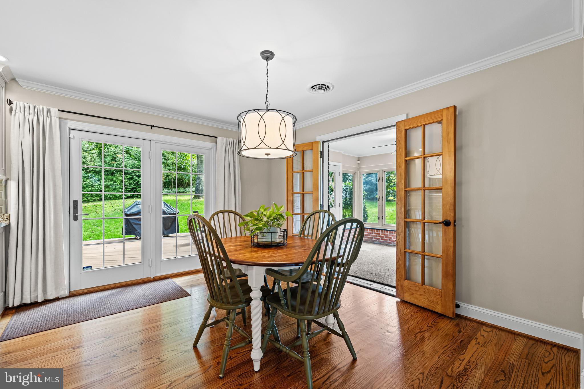 5507 Williams Road Hydes, MD 21082 - Photo 13 of 39 a view of a dining room with furniture window and wooden floor