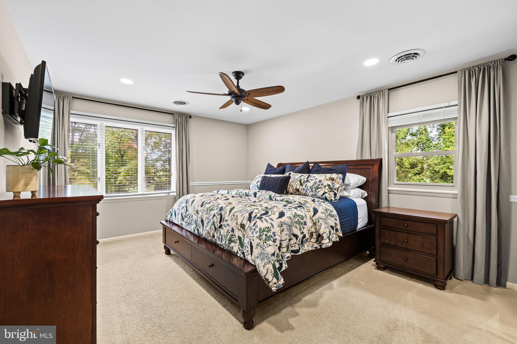 5507 Williams Road Hydes, MD 21082 - Photo 16 of 39 a bed sitting in a spacious bedroom next to a window
