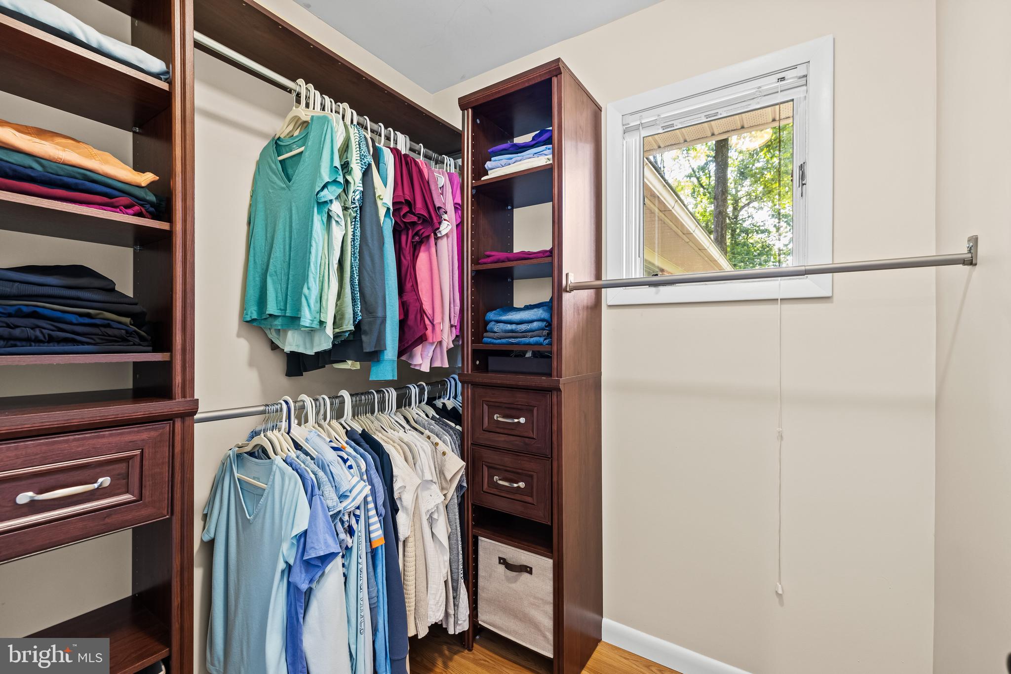 5507 Williams Road Hydes, MD 21082 - Photo 20 of 39 a view of walk in closet with clothes and shoes