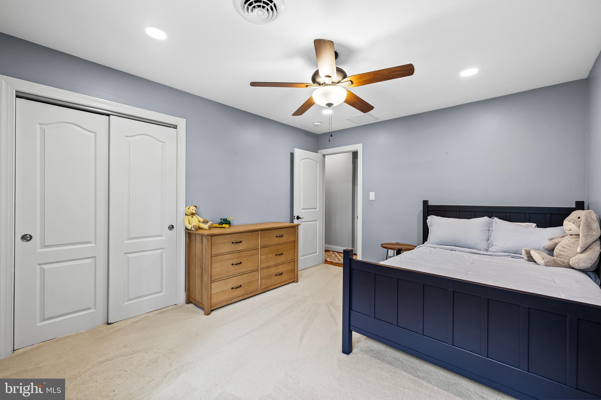 5507 Williams Road Hydes, MD 21082 - Photo 21 of 39 a bedroom with a bed and a chandelier