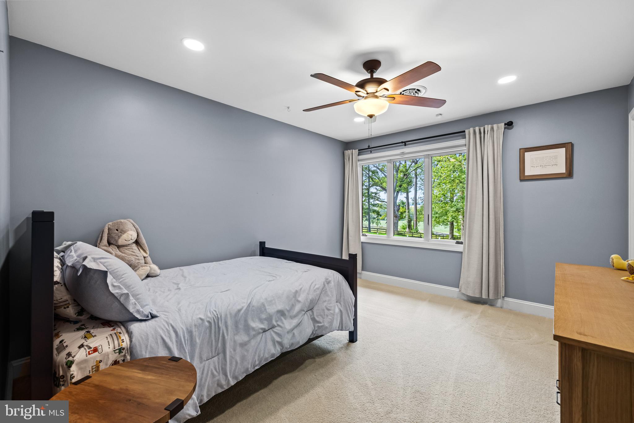 5507 Williams Road Hydes, MD 21082 - Photo 22 of 39 a bedroom with a bed and a chandelier