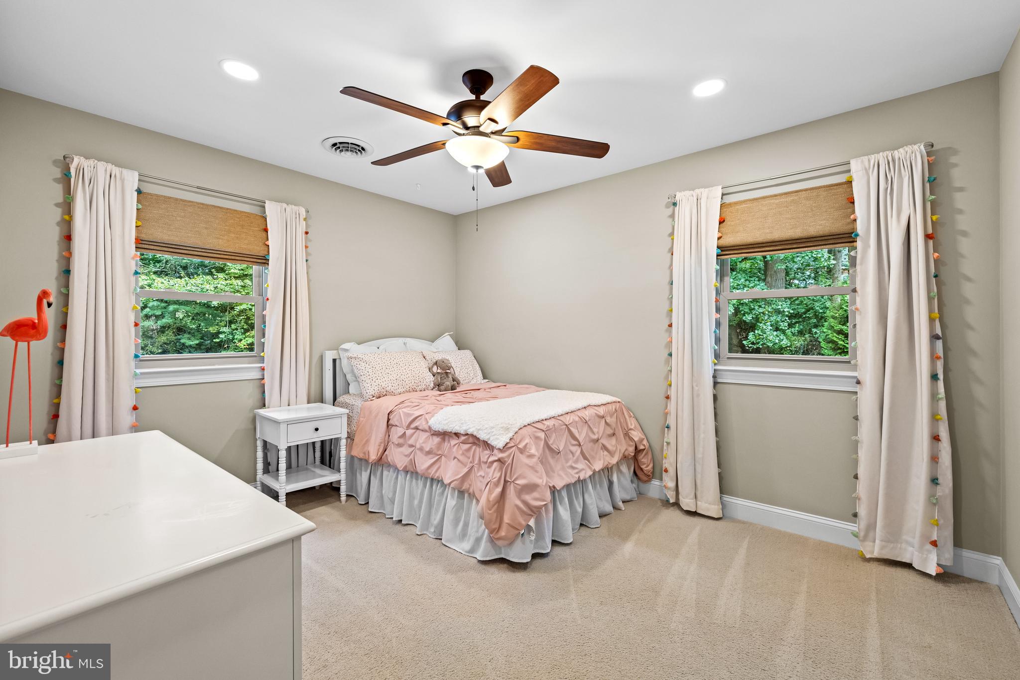 5507 Williams Road Hydes, MD 21082 - Photo 26 of 39 a spacious bedroom with a bed and a large window