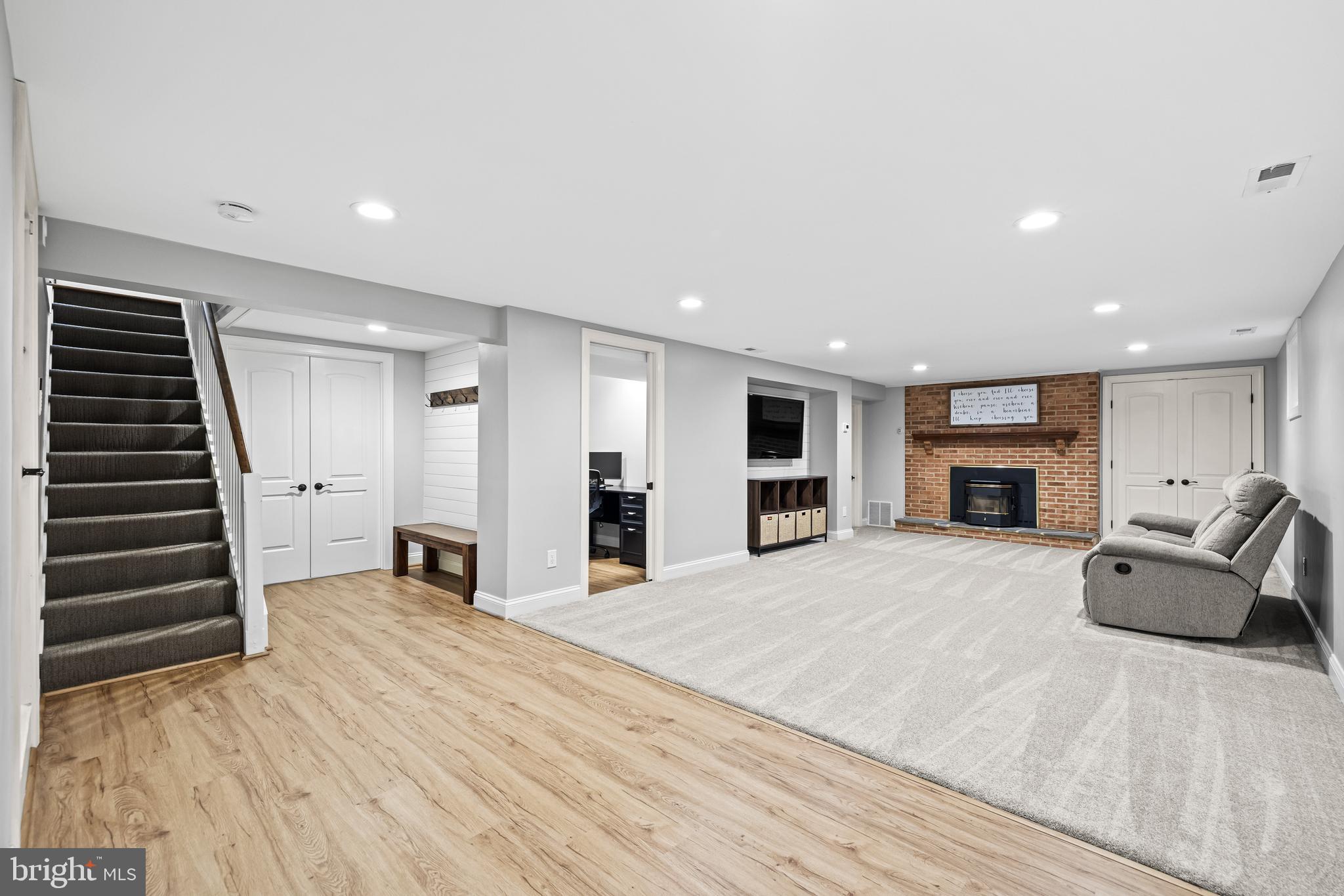 5507 Williams Road Hydes, MD 21082 - Photo 27 of 39 a large room with furniture and a fireplace