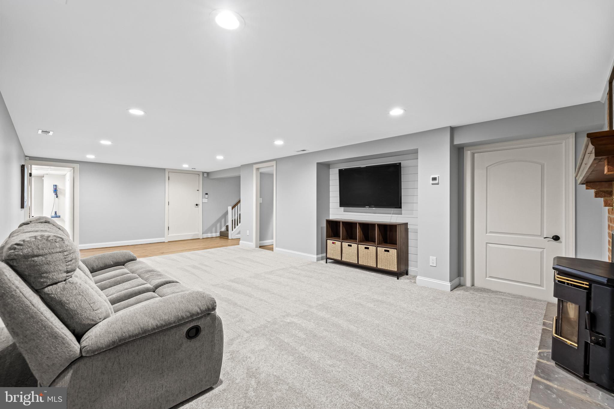 5507 Williams Road Hydes, MD 21082 - Photo 28 of 39 a living room with furniture and a flat screen tv