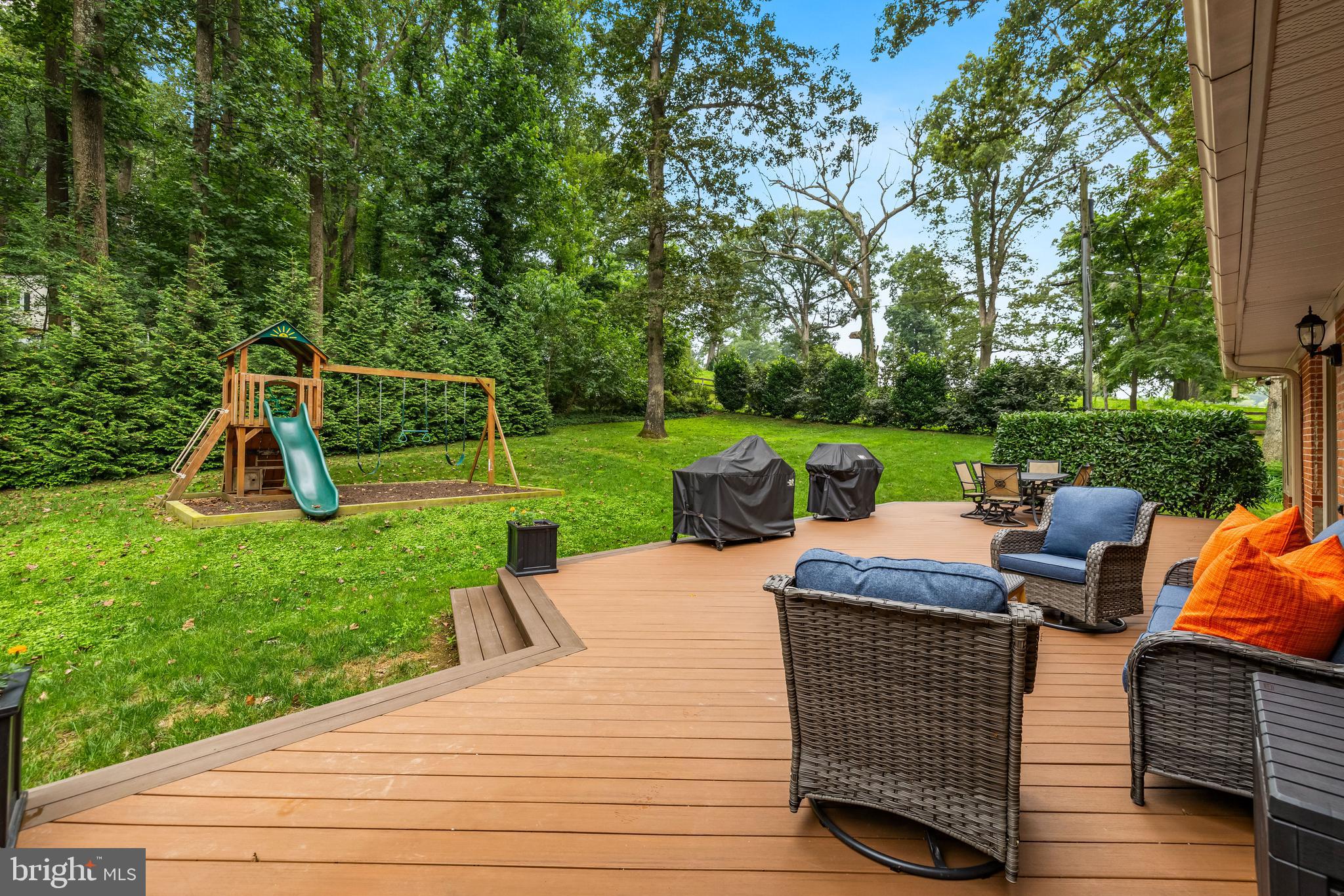 5507 Williams Road Hydes, MD 21082 - Photo 33 of 39 a view of a deck with chairs and a yard