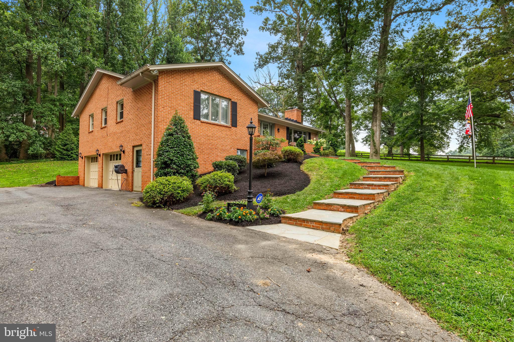 5507 Williams Road Hydes, MD 21082 - Photo 35 of 39 a front view of a house with garden