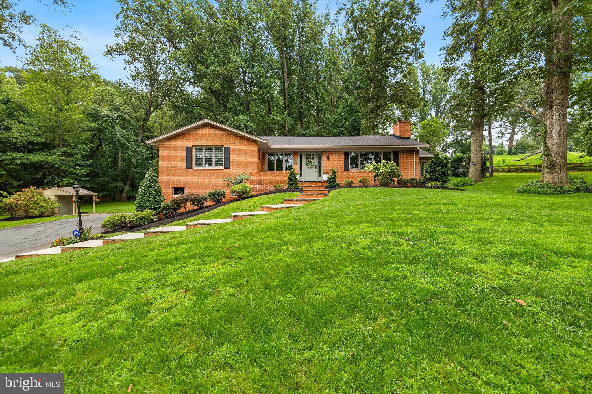 5507 Williams Road Hydes, MD 21082 - Photo 36 of 39 a front view of a house with a garden