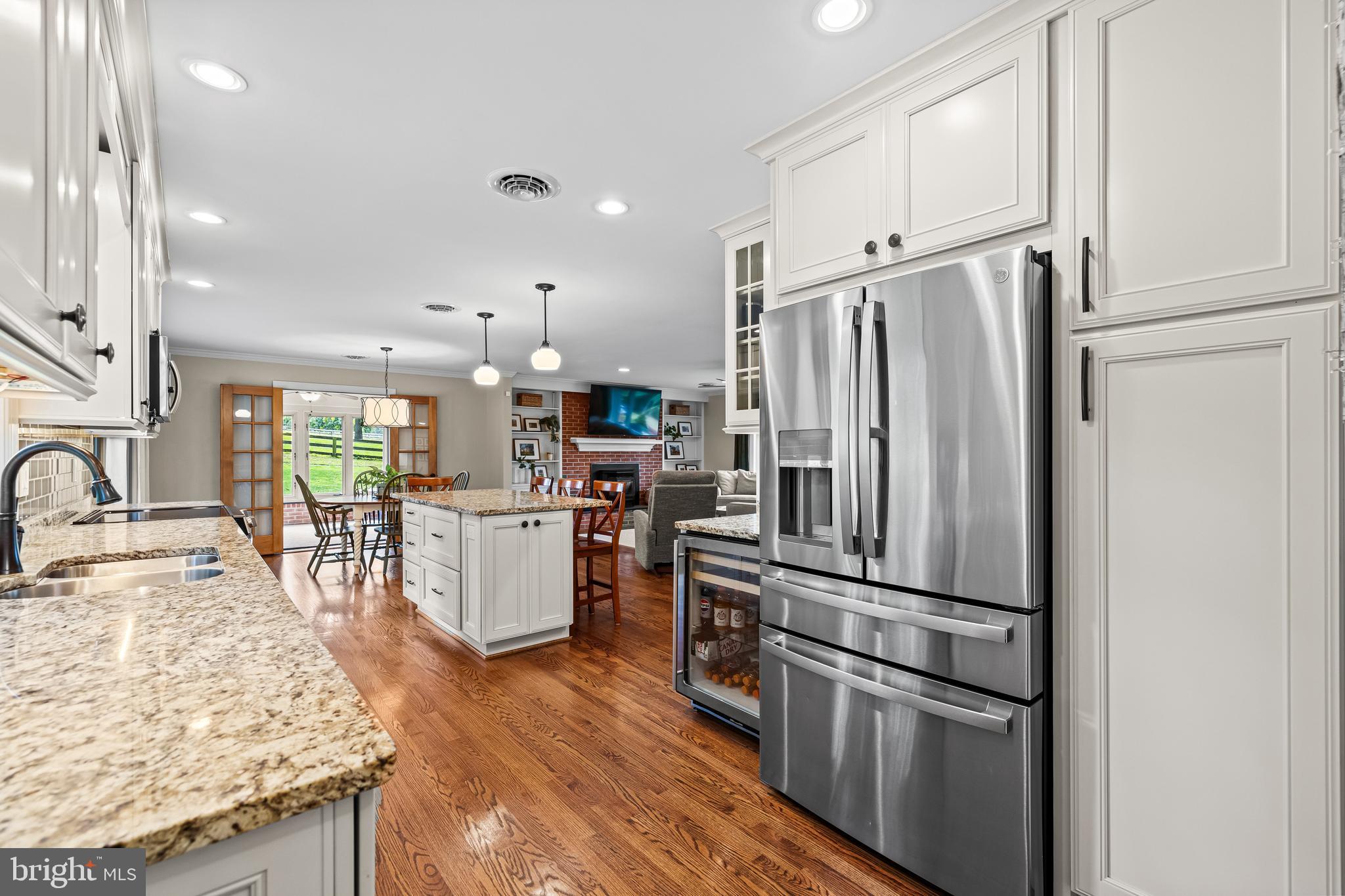 5507 Williams Road Hydes, MD 21082 - Photo 5 of 39 a kitchen with stainless steel appliances granite countertop a refrigerator stove microwave and sink