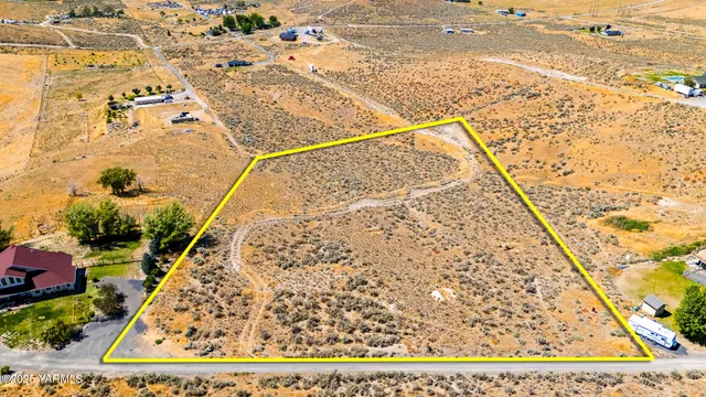 a view of a city with mountains