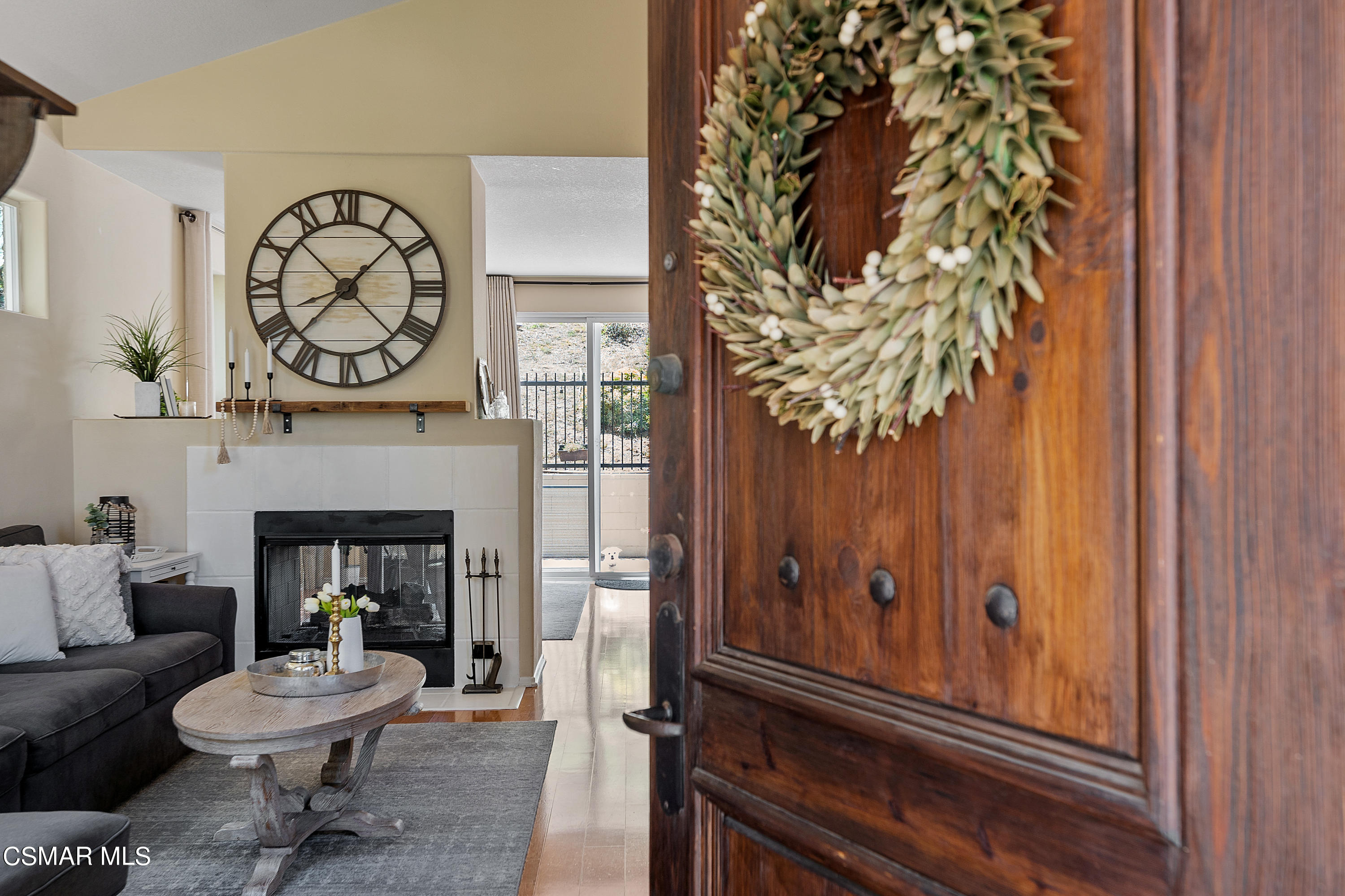 3902 Sarno Court Moorpark, CA 93021 - Photo 3 of 46 a living room with a couch and a fireplace
