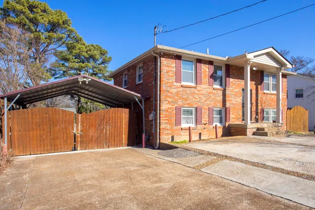 a view of a house with a roof deck