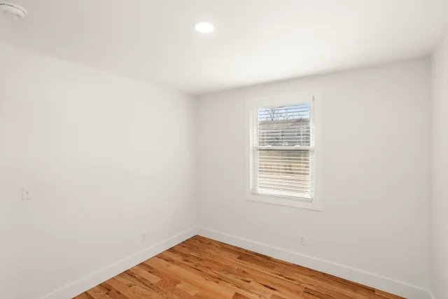 a view of a room that has a window in it