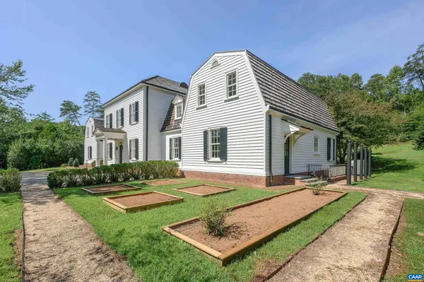 a house view with a garden space