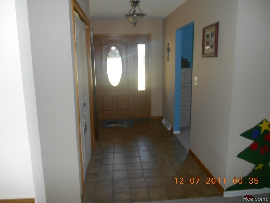 15200 Haggerty Road Belleville, MI 48111 - Photo 60 of 99 CUSTOM CERAMIC FLOORING IN FOYER