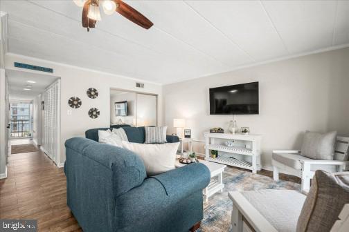 11 134th Street, Unit 205 Ocean City, MD 21842 - Photo 4 of 29 a living room with furniture and a flat screen tv