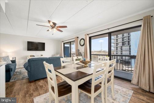 11 134th Street, Unit 205 Ocean City, MD 21842 - Photo 5 of 29 a view of a dining room with furniture window and outside view