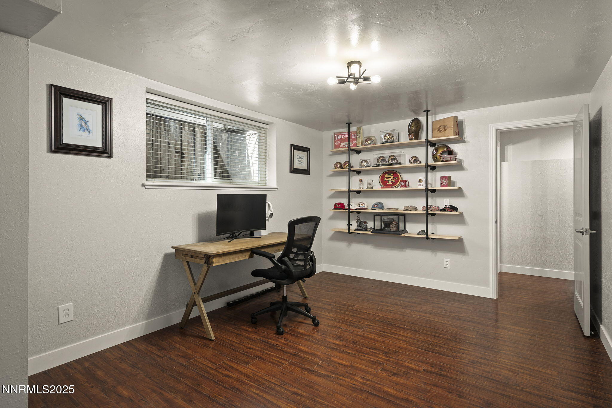 1080 Tudor Court Reno, NV 89503 - Photo 17 of 30 a workspace with wooden floor