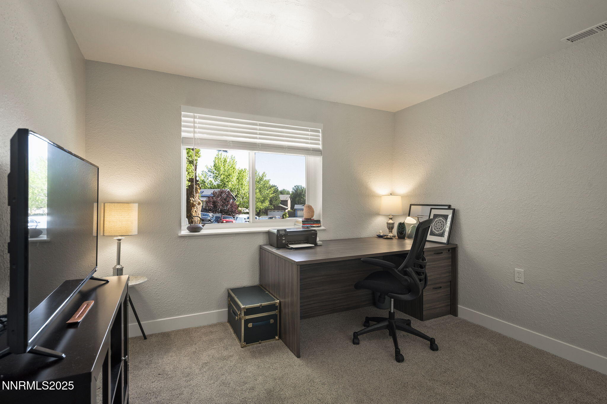 1080 Tudor Court Reno, NV 89503 - Photo 19 of 30 a view of a workspace with furniture and a window