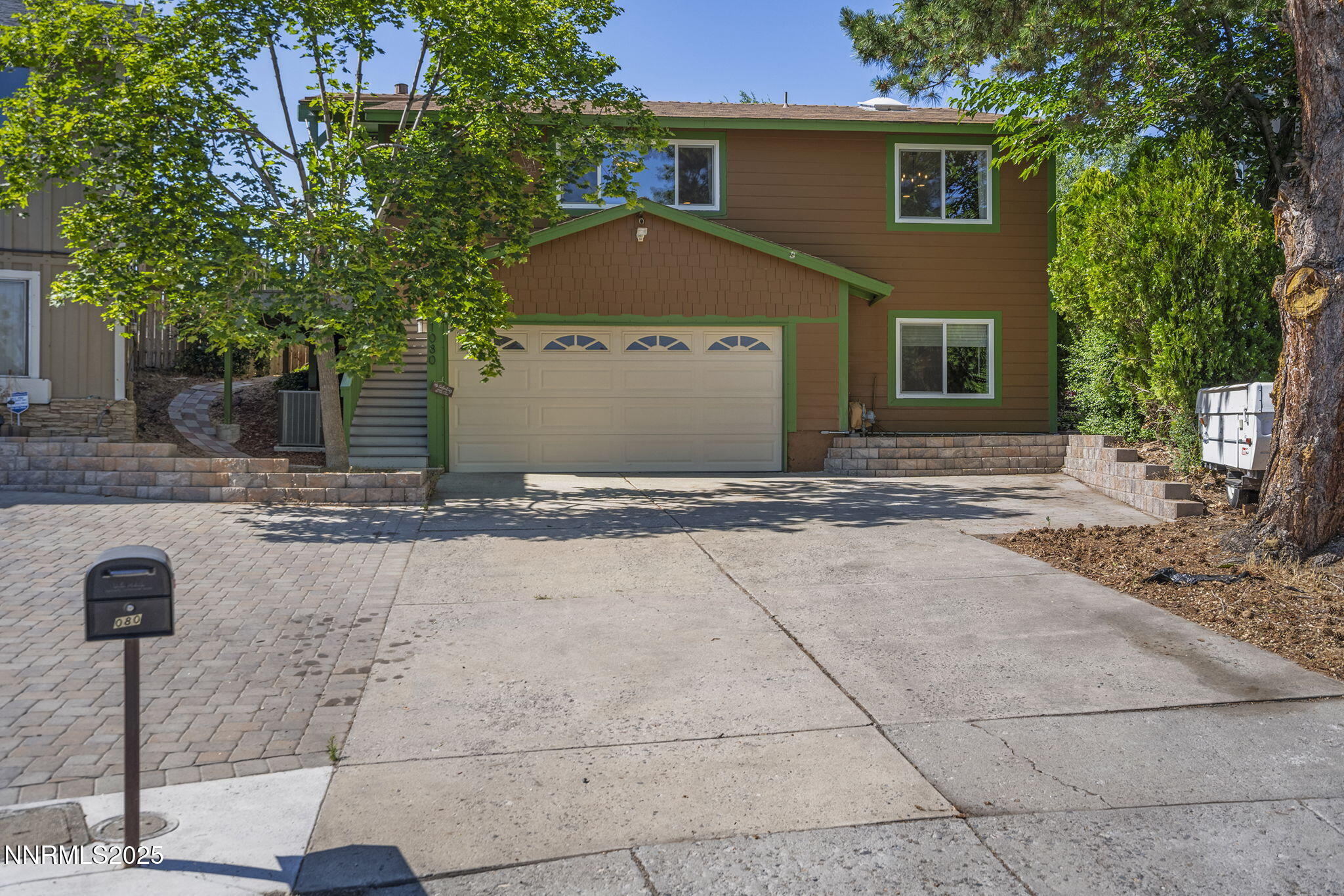 1080 Tudor Court Reno, NV 89503 - Photo 2 of 30 a front view of a house with a yard