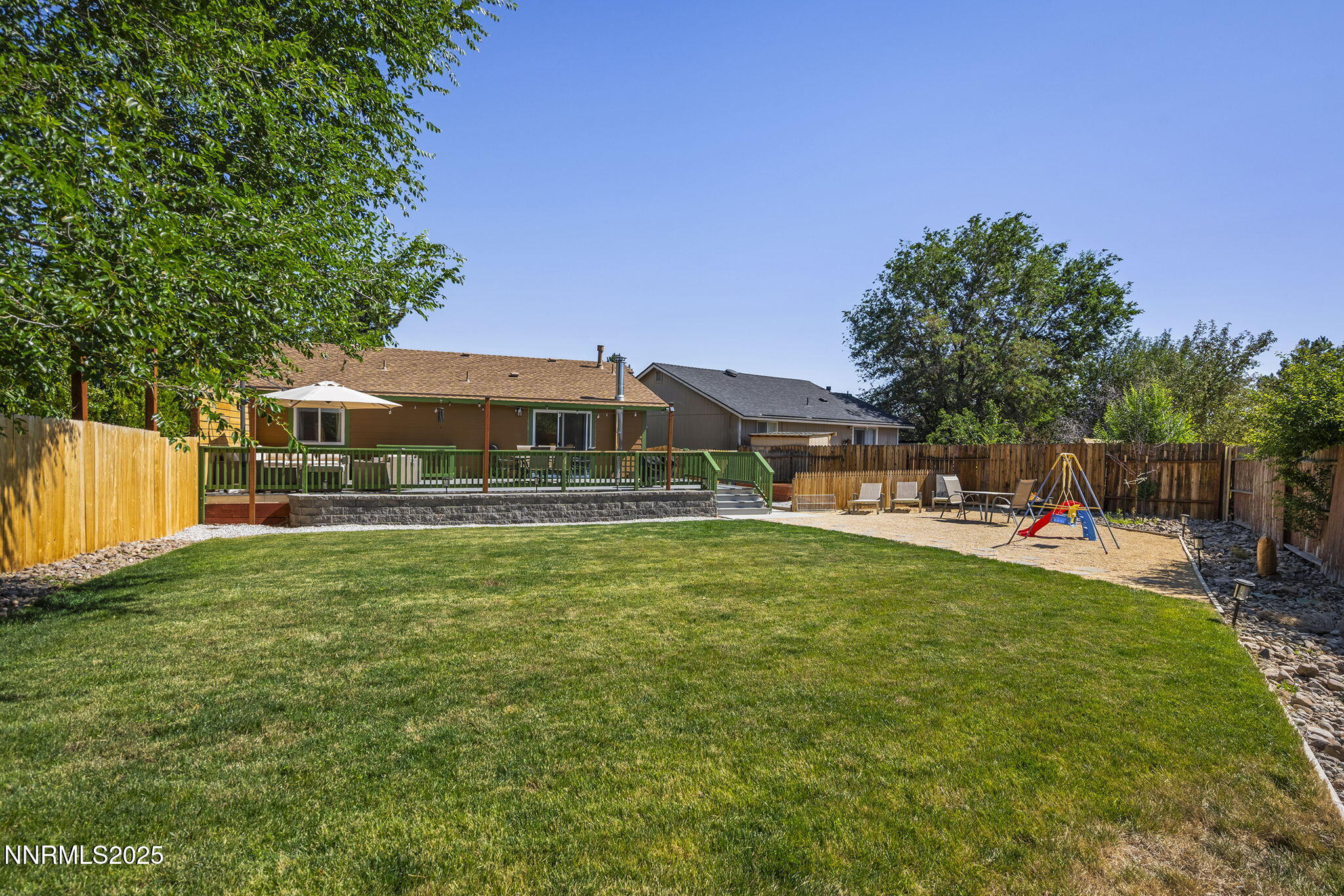 1080 Tudor Court Reno, NV 89503 - Photo 24 of 30 a front view of a house with a garden