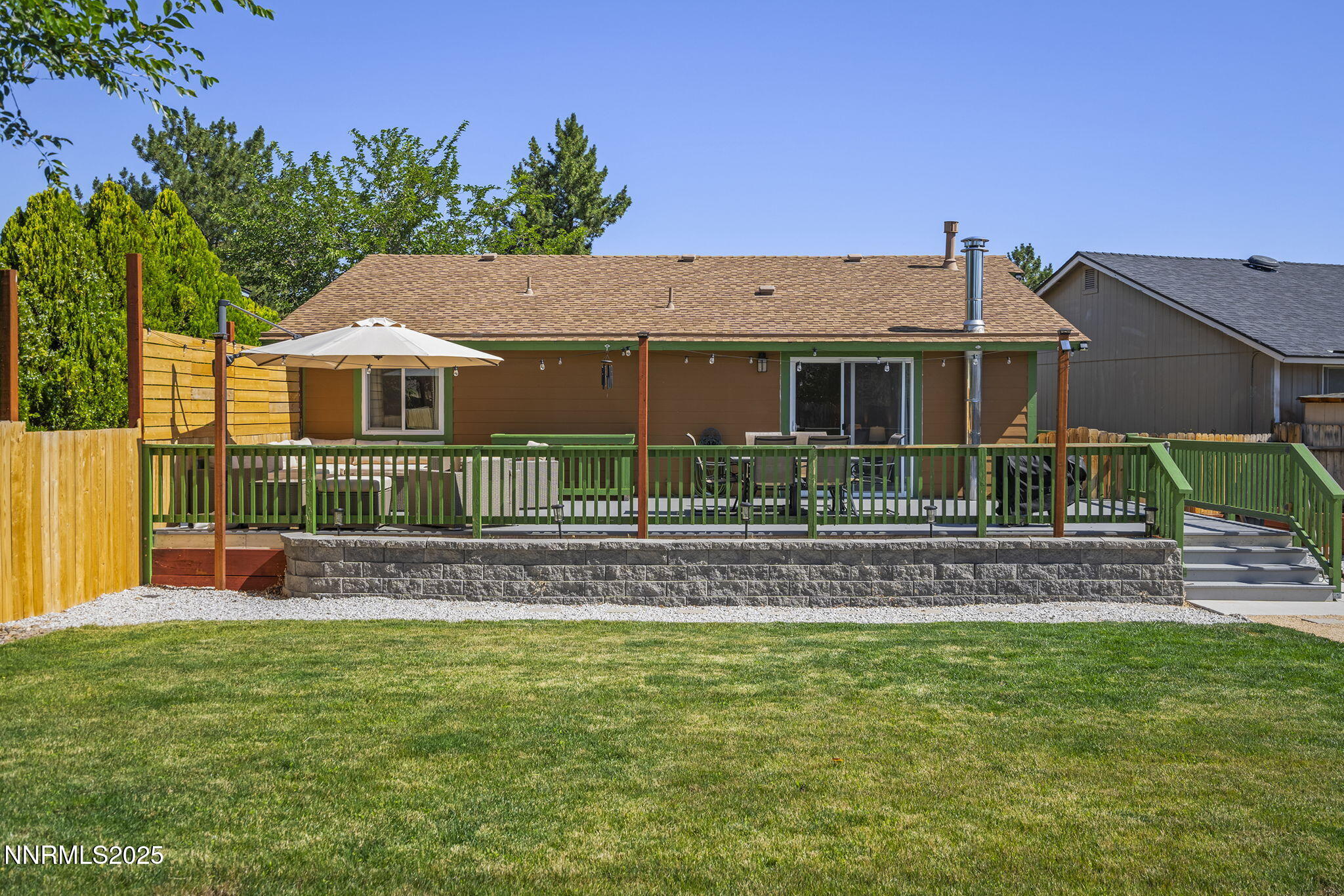 1080 Tudor Court Reno, NV 89503 - Photo 25 of 30 front view of a house with a yard