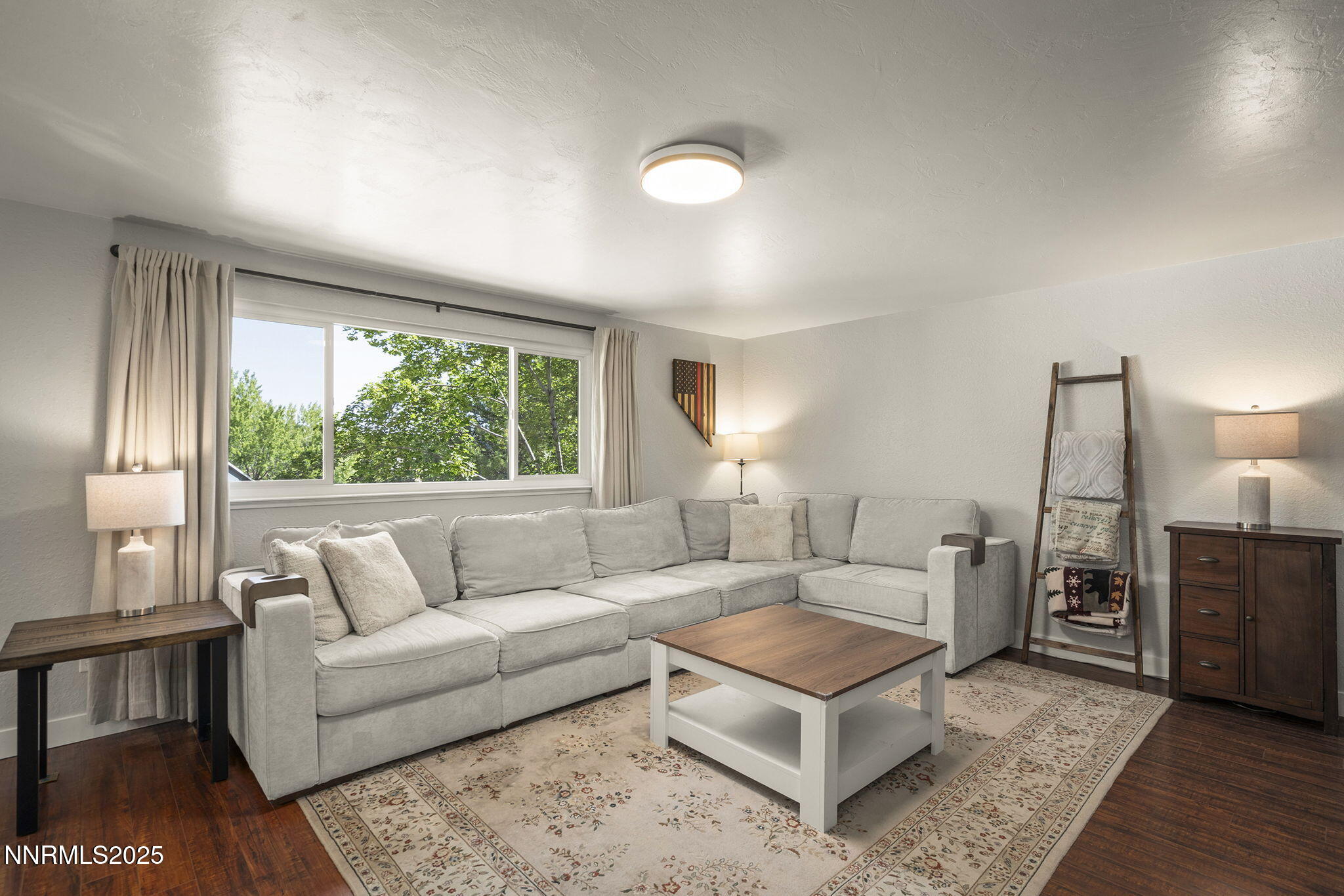 1080 Tudor Court Reno, NV 89503 - Photo 5 of 30 a living room with furniture and a large window