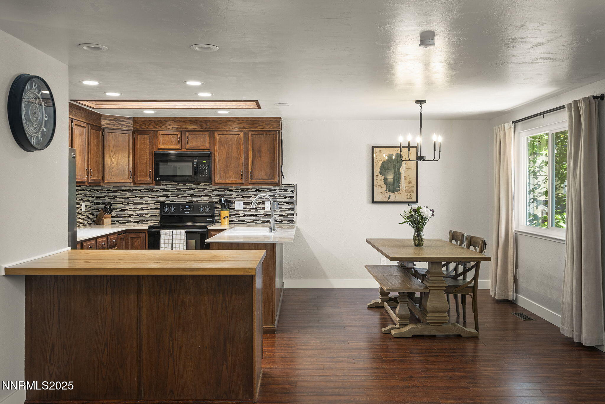 1080 Tudor Court Reno, NV 89503 - Photo 7 of 30 a kitchen with a table and chairs