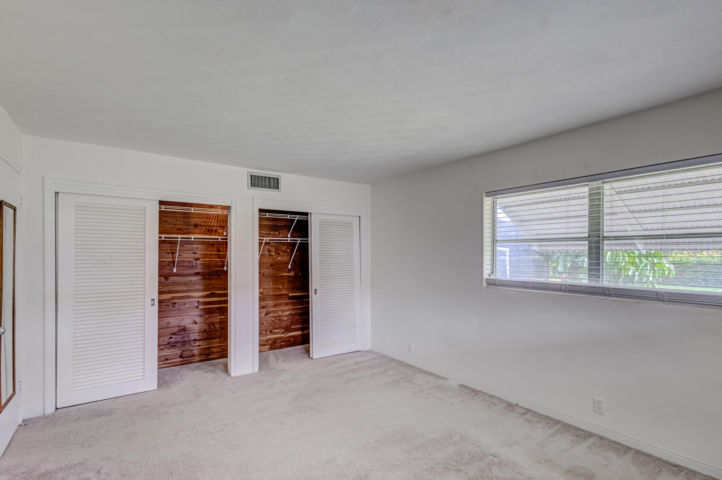 11170 Monet Ridge Road Palm Beach Gardens, FL 33410 - Photo 18 of 45 Master Bedroom w/Cedar Closets