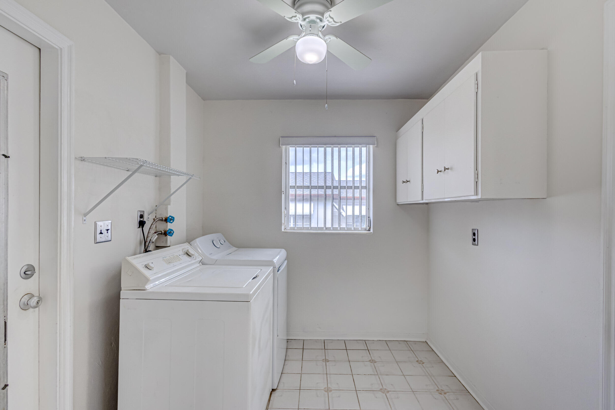 11170 Monet Ridge Road Palm Beach Gardens, FL 33410 - Photo 26 of 45 Laundry Room
