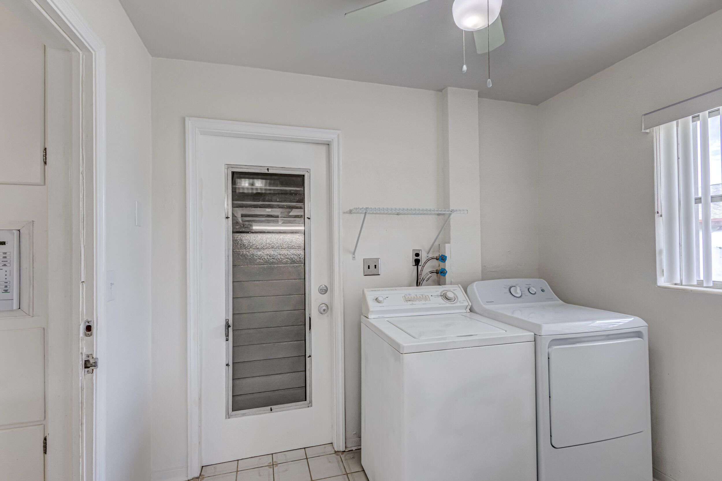 11170 Monet Ridge Road Palm Beach Gardens, FL 33410 - Photo 27 of 45 Laundry Room to Garage