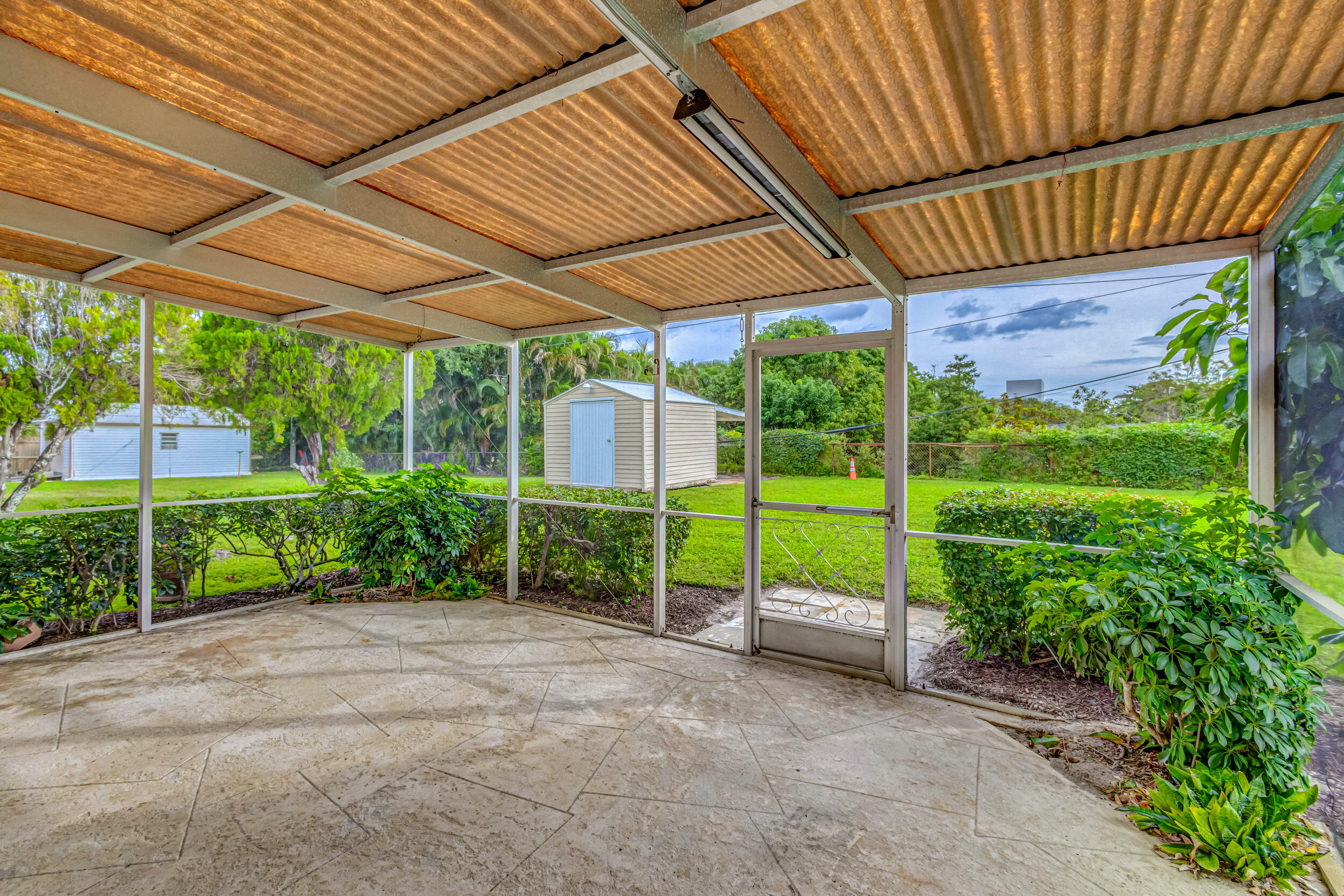 11170 Monet Ridge Road Palm Beach Gardens, FL 33410 - Photo 31 of 45 Back Patio/Shed