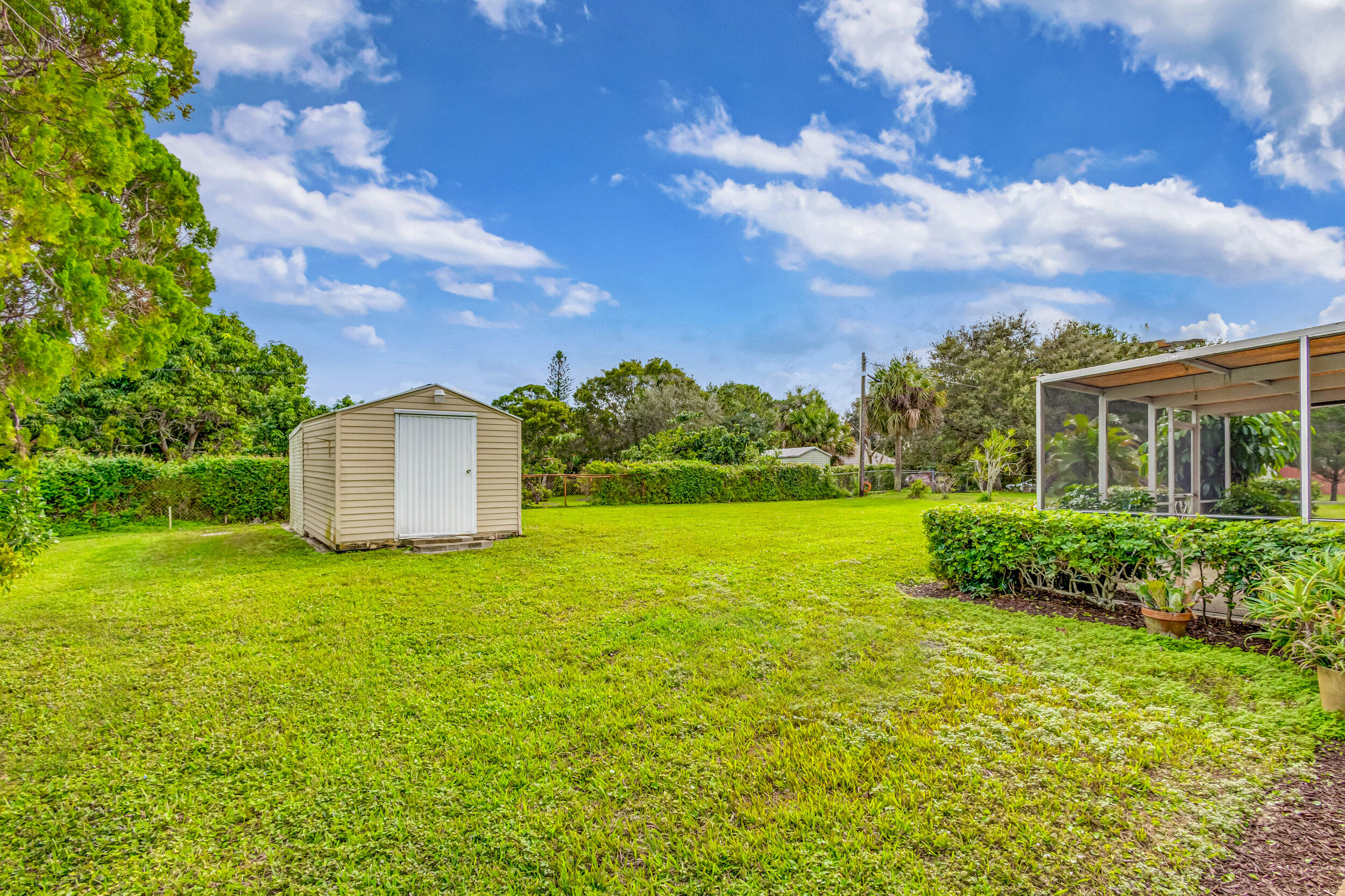 11170 Monet Ridge Road Palm Beach Gardens, FL 33410 - Photo 34 of 45 Backyard w/Shed