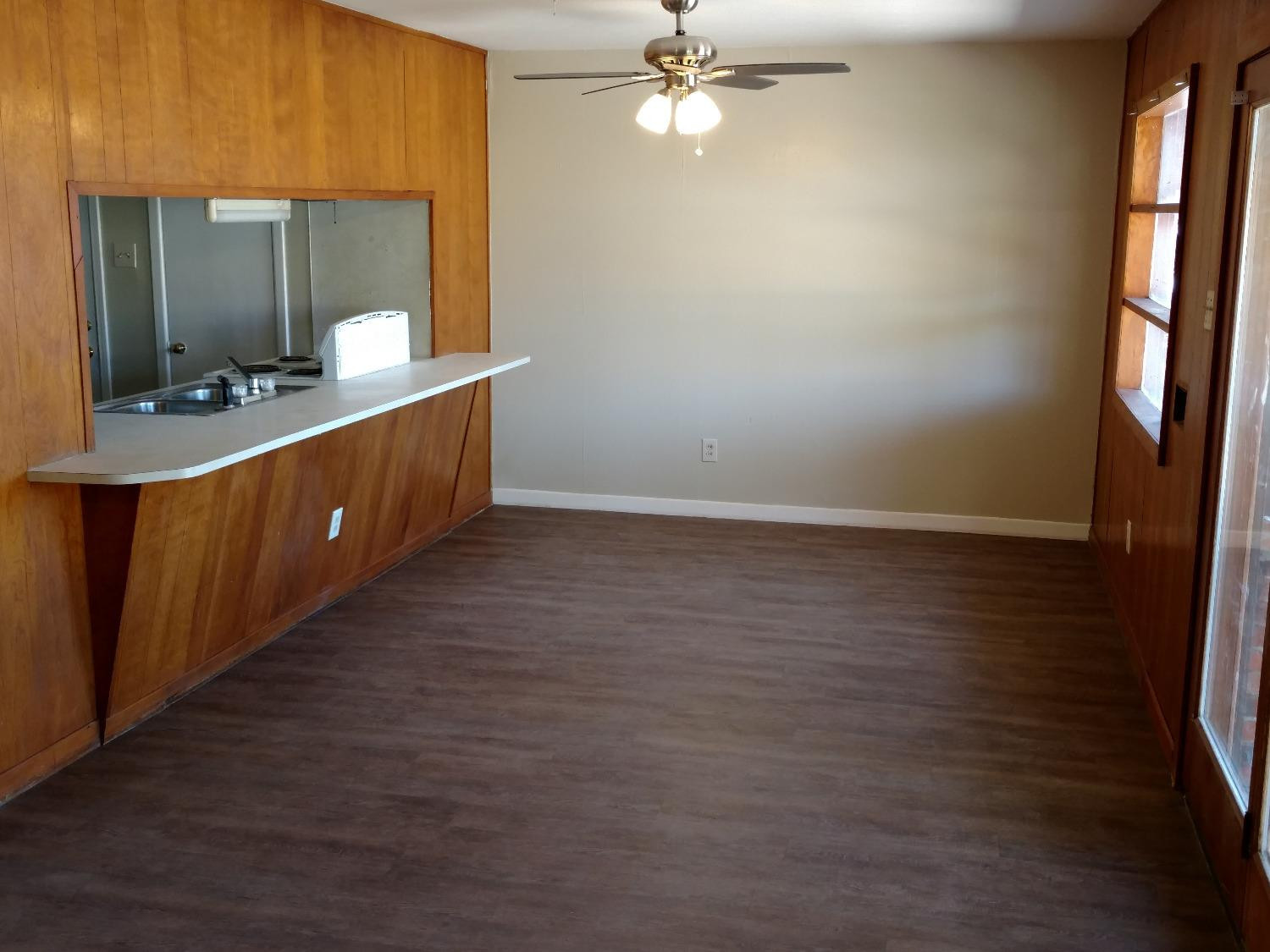 2812 43rd Street, Unit 6 Lubbock, TX 79413 - Photo 2 of 10 a bathroom with a sink a mirror and a vanity