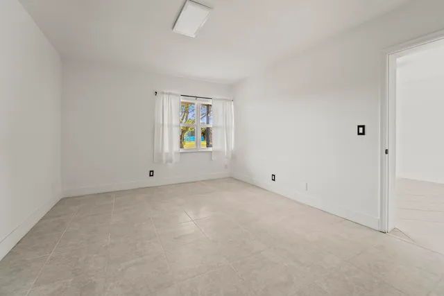 an empty room with a window