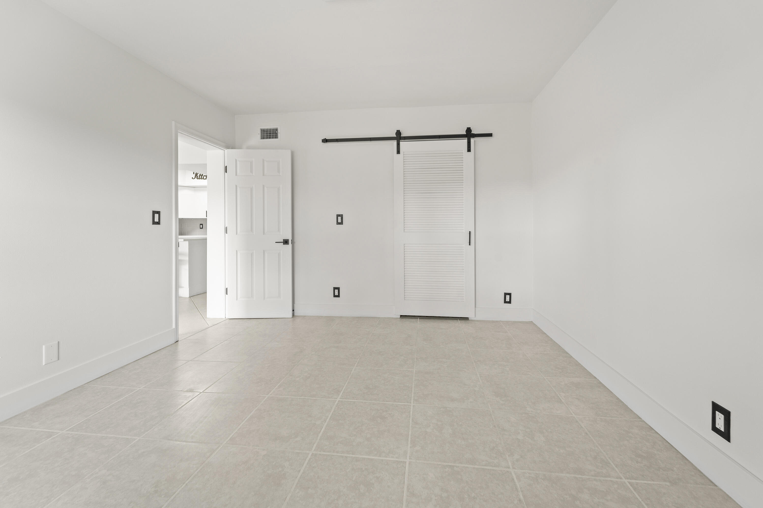 9500 Southwest 3rd Street, Unit 130 Boca Raton, FL 33428 - Photo 20 of 38 a view of an empty room