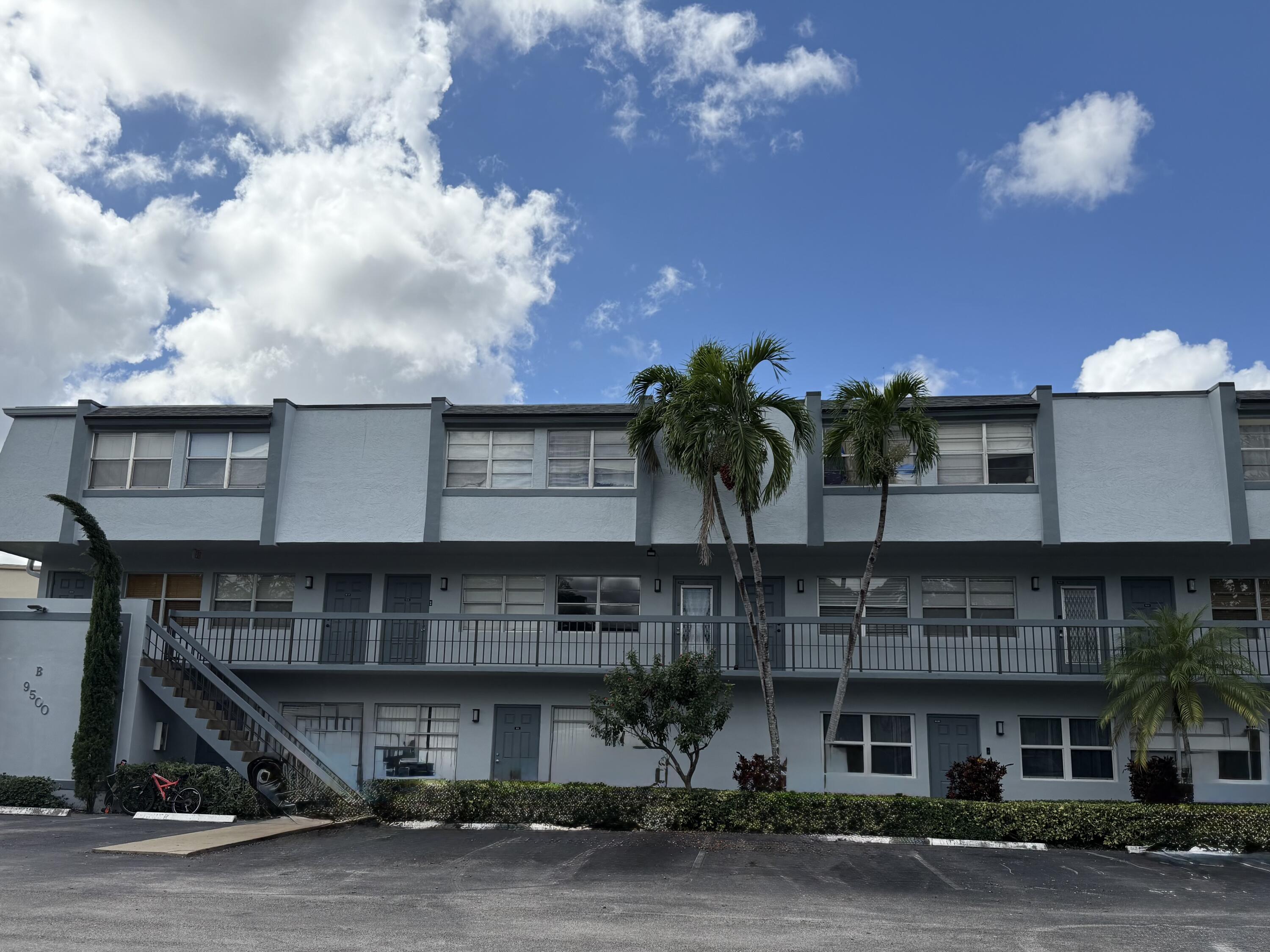 9500 Southwest 3rd Street, Unit 130 Boca Raton, FL 33428 - Photo 2 of 38 a front view of a building