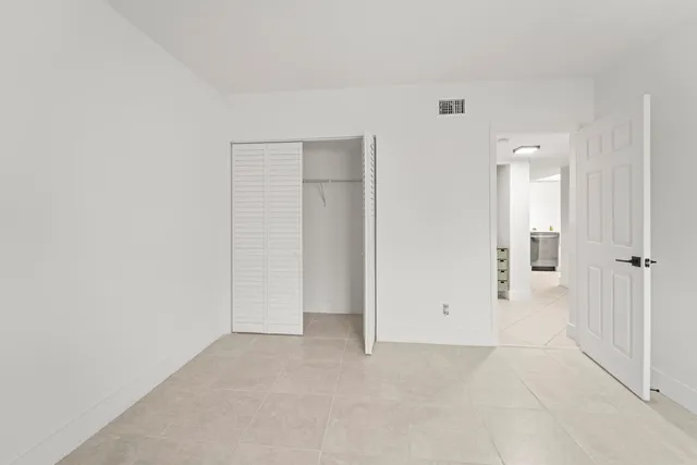 a view of an outdoor space and basketball court