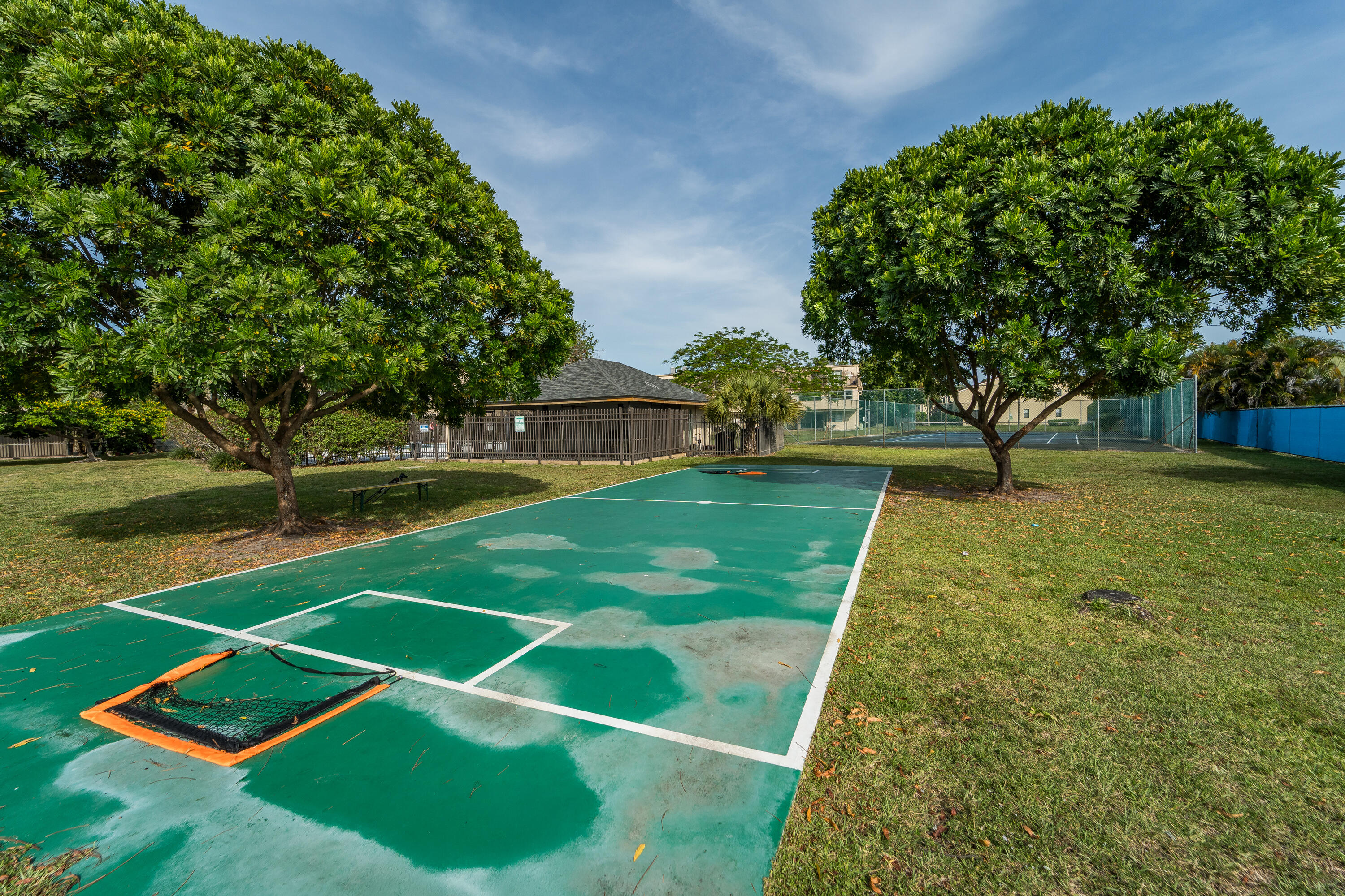 9500 Southwest 3rd Street, Unit 130 Boca Raton, FL 33428 - Photo 30 of 38 a view of an outdoor space and basketball court
