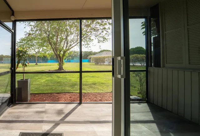 a view of a house with a street
