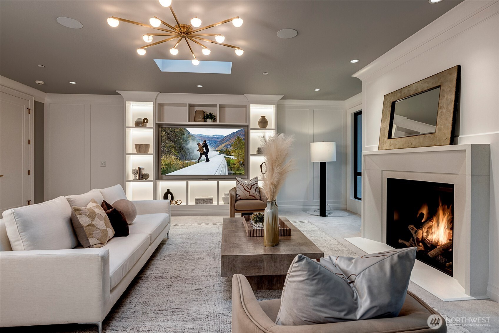 2837 Evergreen Point Road Medina, WA 98039 - Photo 20 of 39 a living room with furniture and a fireplace