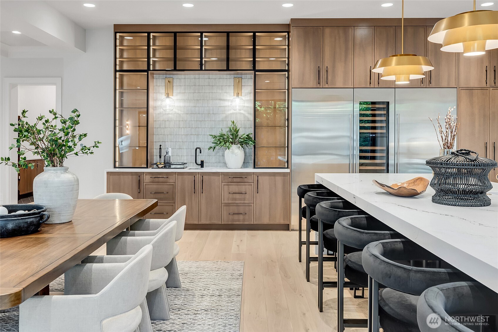 2837 Evergreen Point Road Medina, WA 98039 - Photo 6 of 39 a kitchen with a table and chairs in it