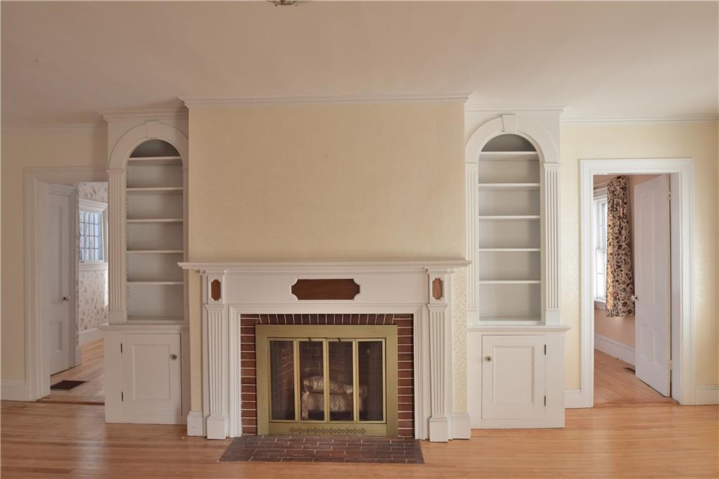 488 Blackstrap Road Falmouth, ME 04105 - Photo 10 of 35 Living Room Fireplace with Built In...